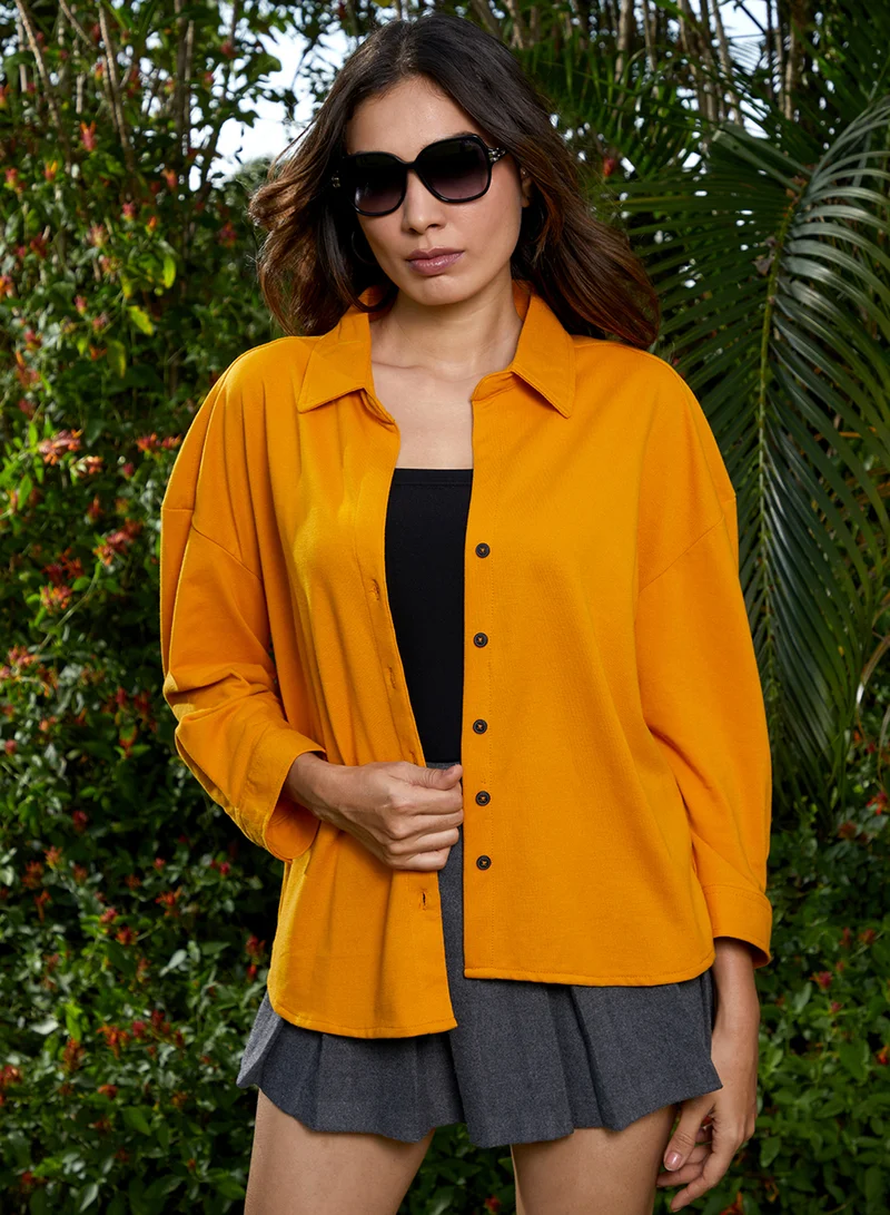 كامبوس سوترا Women's Amber Yellow Solid Oversized Shirt For Casual Wear | Spread Collar | Long Cuffed Sleeves | Button Closure | Shirt Crafted With Comfort Fit For Everyday Wear